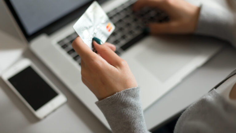 Hands Of Woman Shopping In Internet Making Instant Payment Transaction
